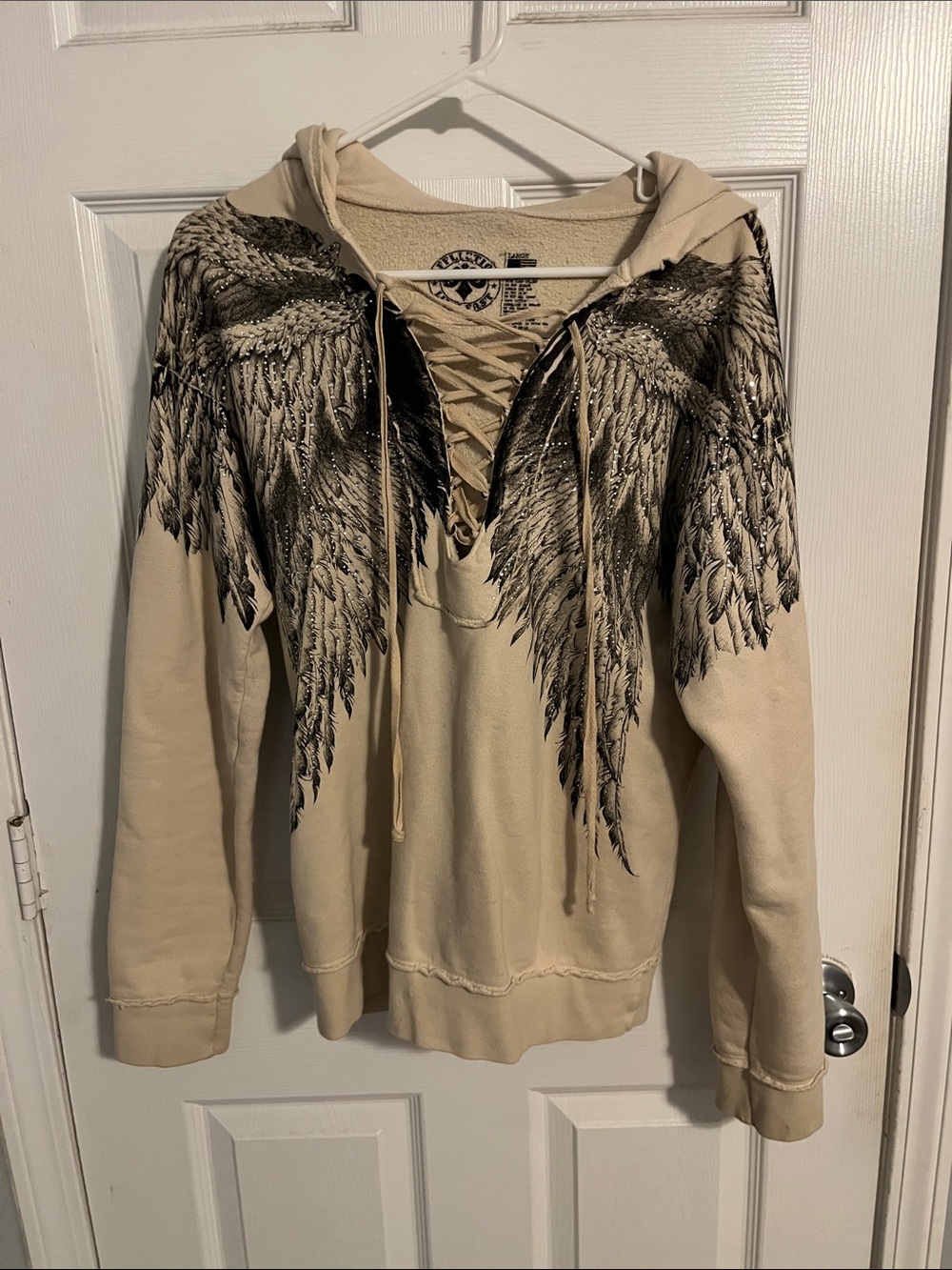 Affliction Beige V-Neck Lace-Up Hoodie Sweater with Black Wing Print